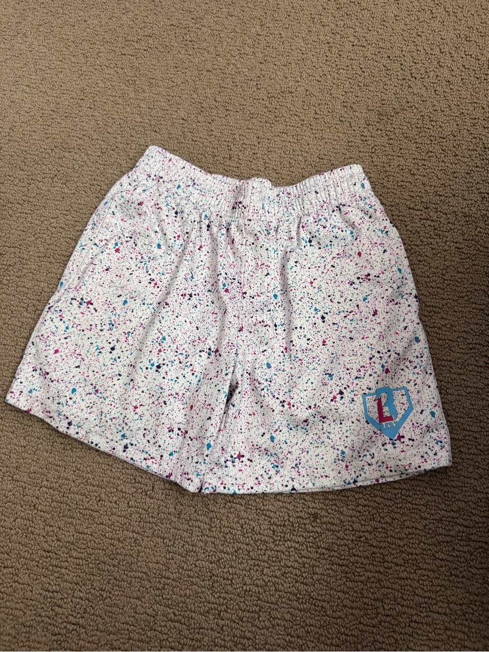 Girls White Speckle Print Athletic Shorts with Blue Accent